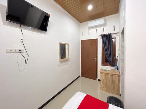 RedDoorz at Rose House Simpang Pemda Medan Selayan, Kota Medan