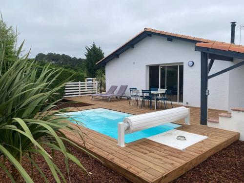 Maison mitoyenne chaleureuse avec piscine chauffée