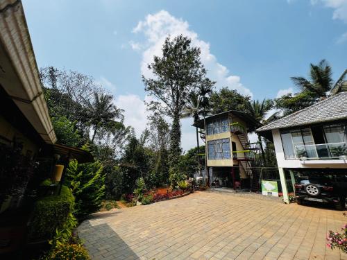 Buitenkant, Raymond's Holiday Homes in Vythiri