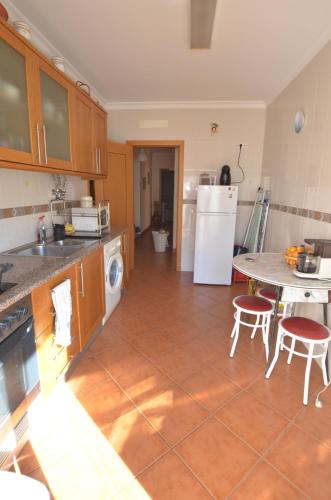 Kitchen, Algarve, spacious T2 with balcony and garage, Armacao de Pera in Armacao De Pera