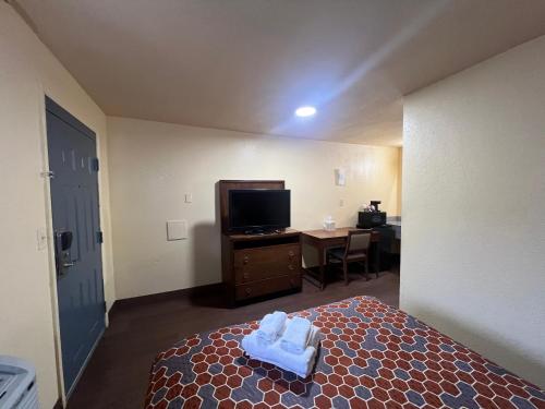 Relax Inn and Suites - Tap to explore photos