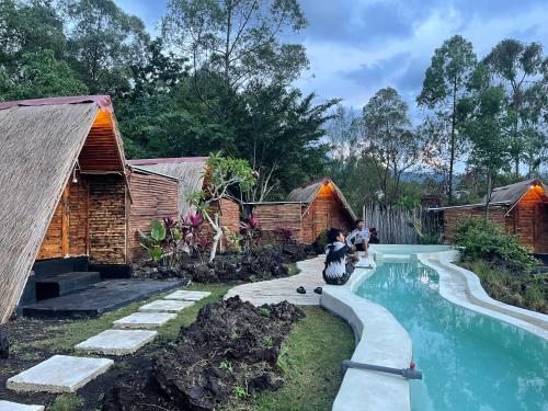 Triangular house and hot spring