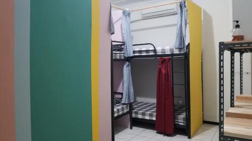 Bed in 6-Bed Mixed Dormitory Room room in CoffeeBunk Hostel