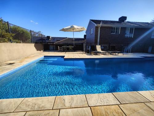 Gorgeous 4-Bedroom House on a Mansion - an acre land with Magnificent Pool & Garden