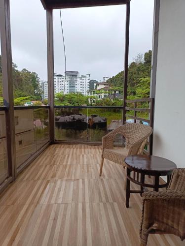 THE BEAUTIFUL MARIGOLD HOTEL near Tan's Camellia Garden