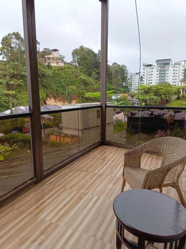 Balcony/terrace, THE BEAUTIFUL MARIGOLD HOTEL near Tan's Camellia Garden