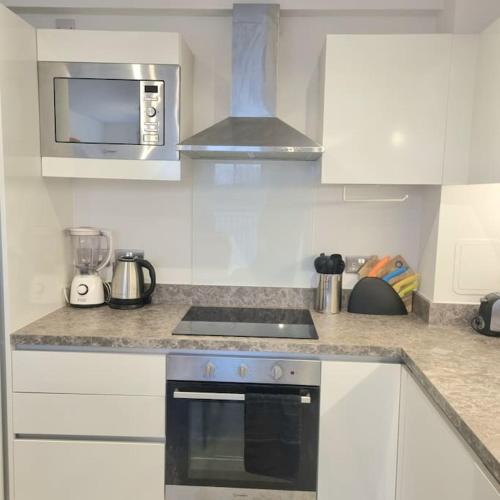 MCR 1BR Getaway with Rooftop Access & Prime Location, Manchester (zdjęcie 8)