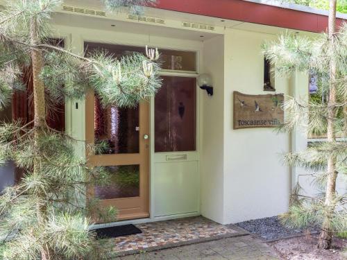 Cozy decorated house with fireplace, surrounded by forest