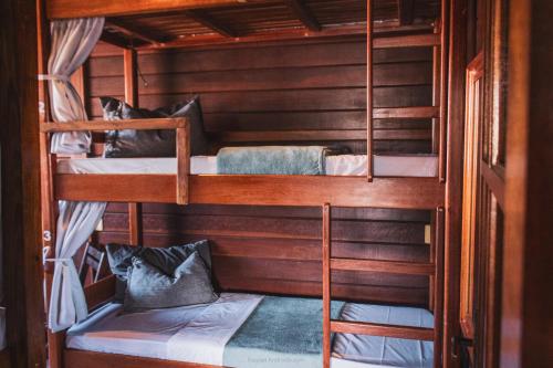 Bed in 6-Bed Female Dormitory Room room in Nômades Beach House - Adventure Hostels