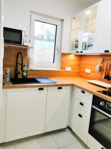 ห้องครัว, Ferienwohnung Löwenstern Niederstetten (Ferienwohnung Lowenstern Niederstetten) in นีเดอร์สเทตเทน