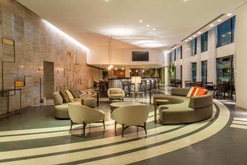 Shared lounge/TV area, Lifestyle Laghetto Collection in Barra da Tijuc