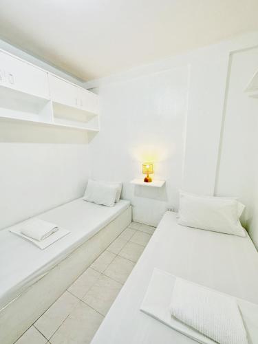 Nomads MNL Backpackers Homestay - near Airport, Manille (photo 4)