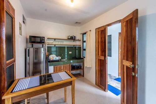 1-BR flat with kitchen private bath hot and cold shower