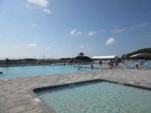 Swimming pool, Hilton Head Island Beach and Tennis Resort near Buttlerfly Mm LLC