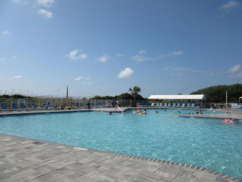 Swimming pool, Hilton Head Island Beach and Tennis Resort near Buttlerfly Mm LLC