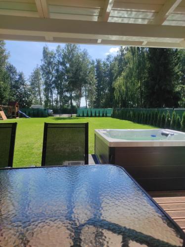 Domek z jacuzzi,kajaki i rowery,sauna -Malinowy Reset