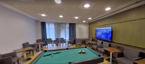 صالة مشتركة/ منطقة التلفزيون, BusinessHotel Am Peetzsee Grünheide (BusinessHotel Am Peetzsee Grunheide) in Grunheide