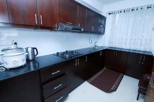 Three-Bedroom Apartment image 9