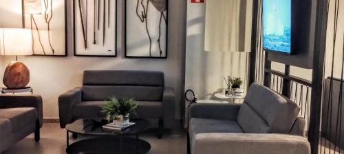 Спільний лаунж/ТБ зона, Hotel Coroados Foz Express in Фоз-ду-Ігуасу