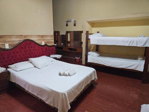 1 queen bed, 1 twin bed, 1 bunk bed