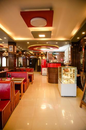 레스토랑, Hotel Edingo Inn in 다란