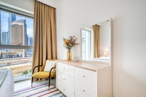 Downtown - 2BR Apartment with Burj Khalifa View - image 2