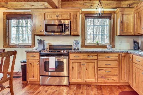 Happy Haven Hill Cabin with Patio and Fire Pit!