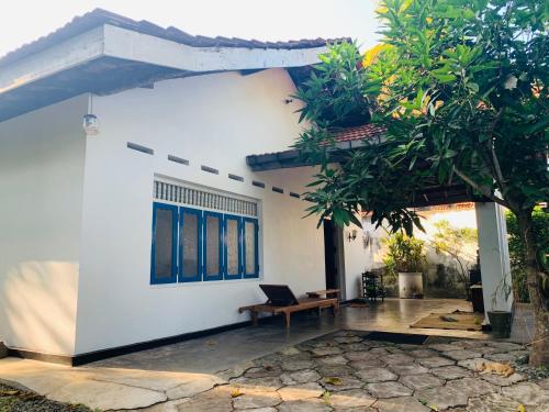 Buddha's house in the middle of a garden oasis