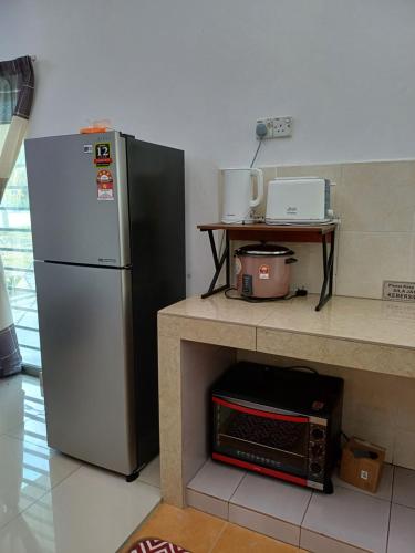 Damai Indah Homestay - Tap to explore photos