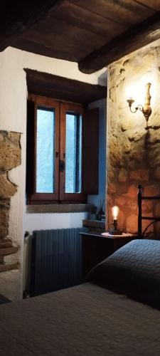 LA CHASCONA DI FARNESE casa di tufo nel borgo