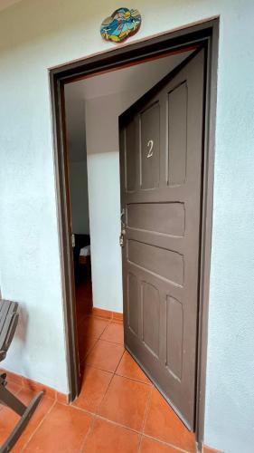 Hostal Nuevo Arenal downtown, private rooms with bathroom