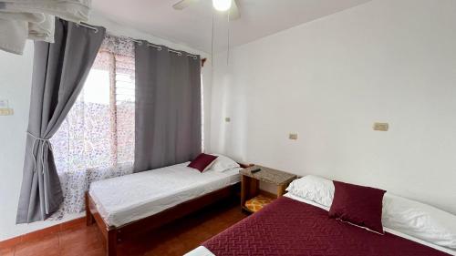 Hostal Nuevo Arenal downtown, private rooms with bathroom