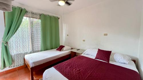 Hostal Nuevo Arenal downtown, private rooms with bathroom