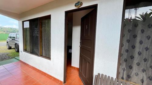 Hostal Nuevo Arenal downtown, private rooms with bathroom