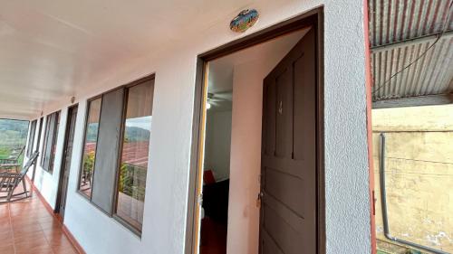 Hostal Nuevo Arenal downtown, private rooms with bathroom