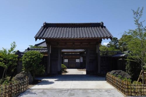 Traditional Japanese house with cherry blossoms