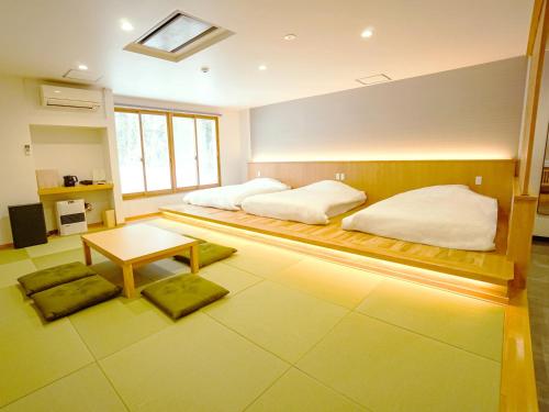 Japanese-Style Room with Tatami Area and Shared Bathroom