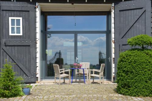 Historische Boerderij FAMILIEKAMER in 納爾德維克