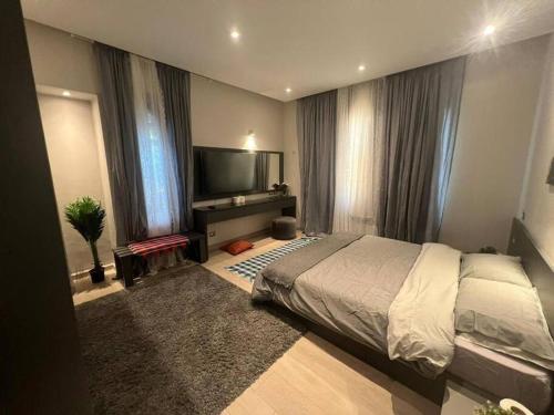 Luxury 1BR with Garden Room Type - One-Bedroom Apartment