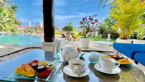 Toit ja joogid, Palm Garden Amed Beach & Spa Resort Bali in Amed