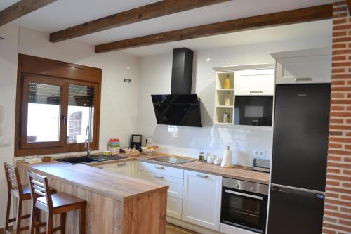 virtuve, Casa Rural La Madroña (Casa Rural La Madrona) in Fuenlabrada de los Montes