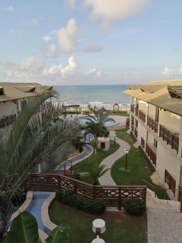 THE FOUNTAINS 110 - Apartamento em lindo condomínio pé na areia da Praia das Fontes em Beberibe - CE