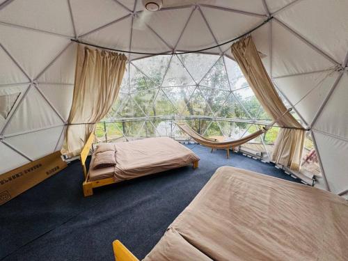 Bungalo 20 m² dengan 1 kamar tidur dan 1 kamar mandi pribadi di Gia Tan 2 (Tropical EGlamping) in Xa Gia Tan