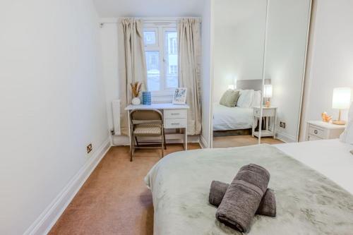 2 bed chic vintage flat at Bayswater, Лондон (фото 10)