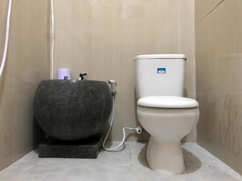 Baño, Grand Hagawa Syariah near Alun Alun Lamongan RedPartner in Lamongan