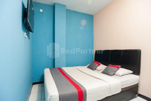 Foto - J&B Rooms Pramuka Jakarta Mitra RedDoorz