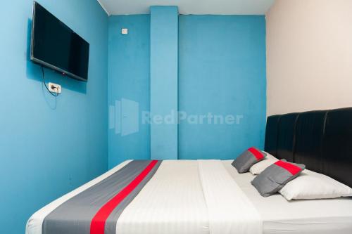 Foto - J&B Rooms Pramuka Jakarta Mitra RedDoorz