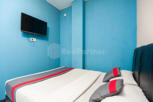 Foto - J&B Rooms Pramuka Jakarta Mitra RedDoorz