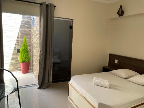 Hotel Novo Apúlia (Hotel Novo Apulia) in การ์เรา