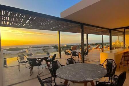 Oceanview Roof Pool with Speakeasy Cafe and Gym plus Parking in Playa del Carmen, Mexico